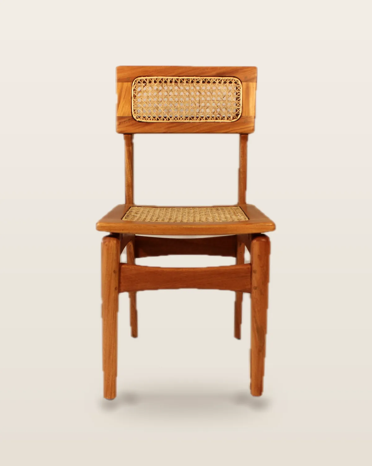 Cane dining chair in a honey finish