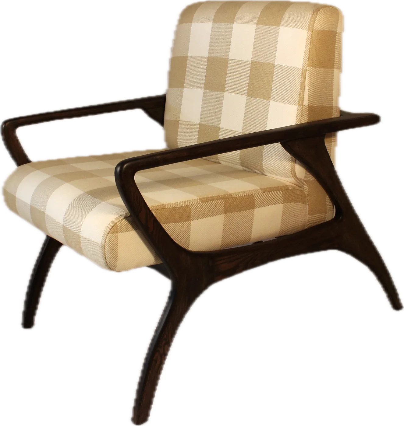 Check lounge chair with a dark sculptural frame