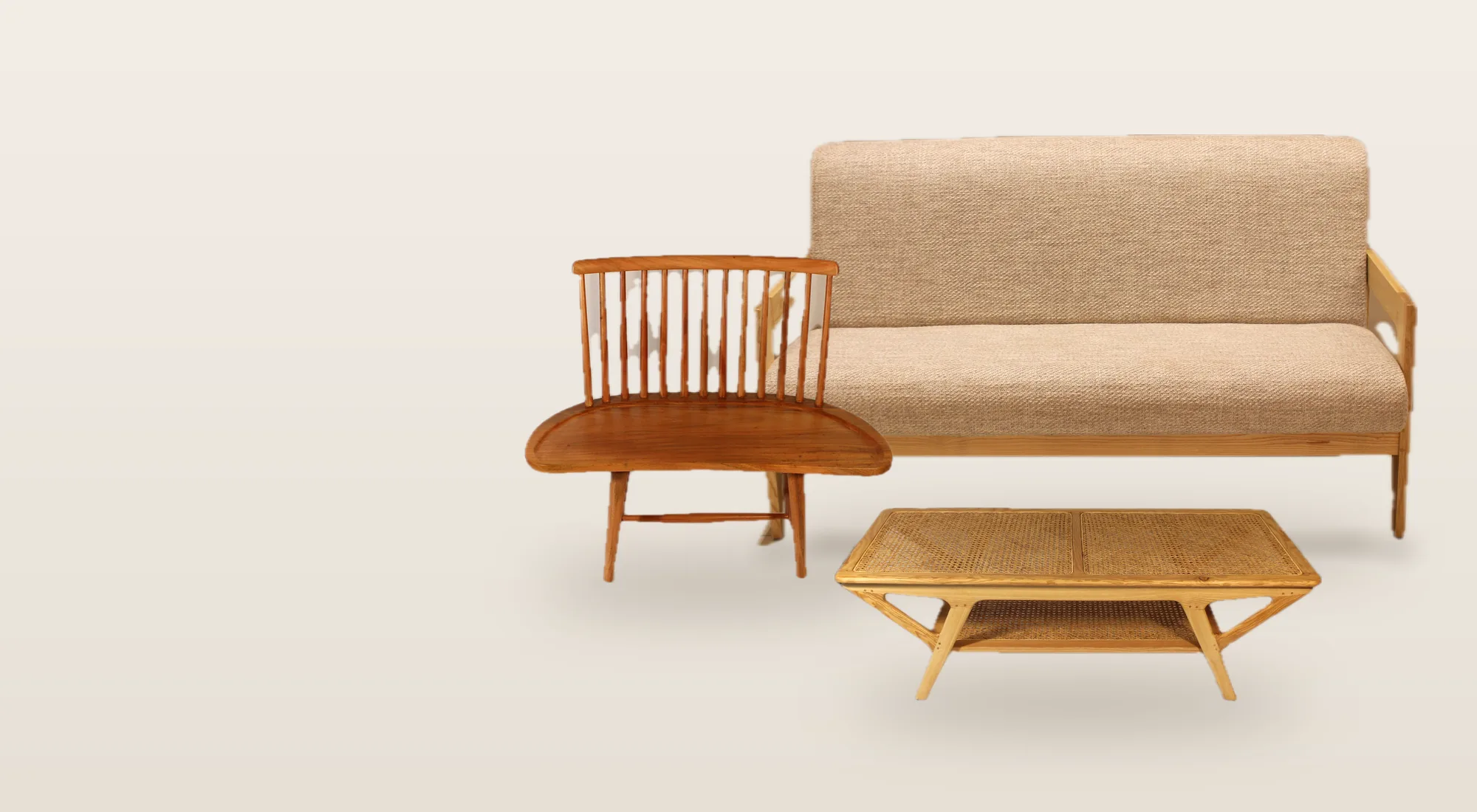 Three-seater sofa, cane coffee table and spindle-back bench styled together